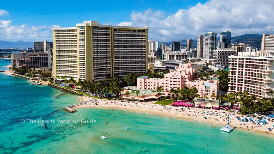 Drone photo of the Royal Hawaiian and the beach just in front jetting out. Hawaii beach photoshoot.