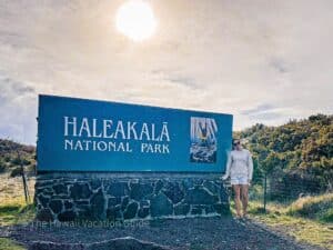 Maui Volcanoes Tour for Cruise Passengers with Erica at Haleakala Sign