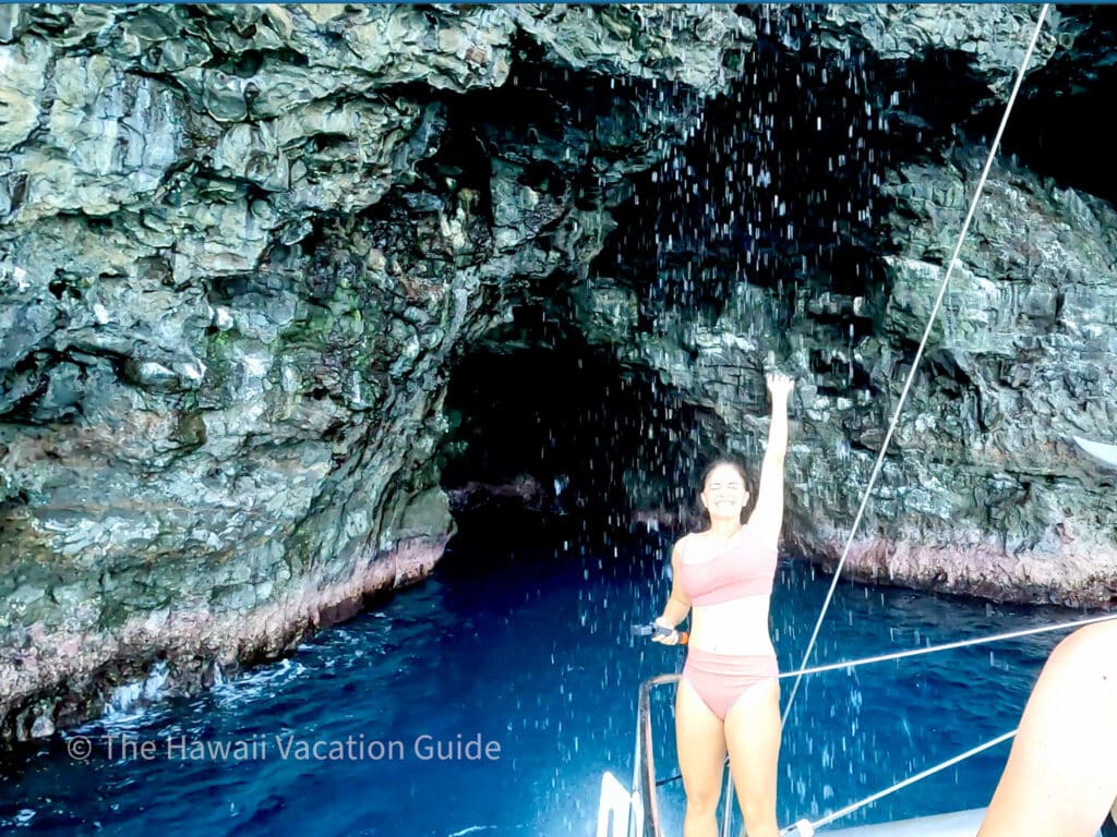 Visit the Na Pali Coast for sea caves and waterfalls