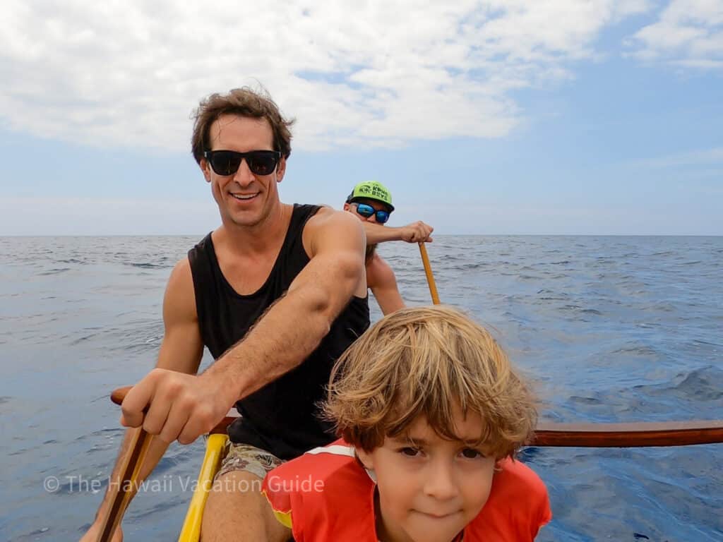 my family paddling on the outrigger canoe in kona